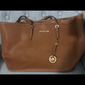 Large Micheal Kors tan coloured tote